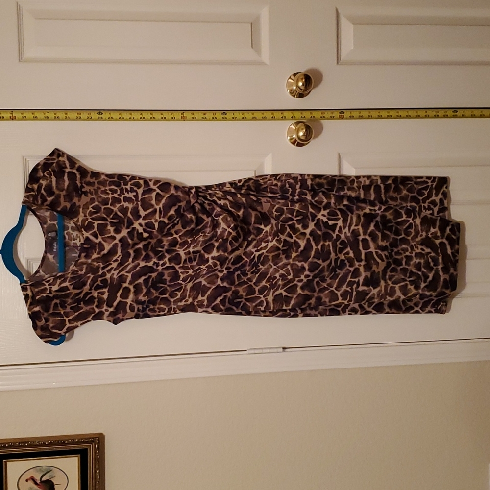 Rafaela Cap sleeve dress with wrap skirt.